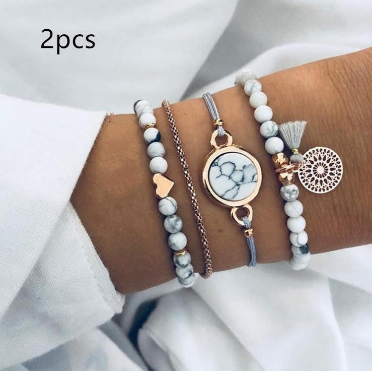 Geometric Hollow Fringed Pine Stone Bracelet – 4-Piece Boho Set for Women