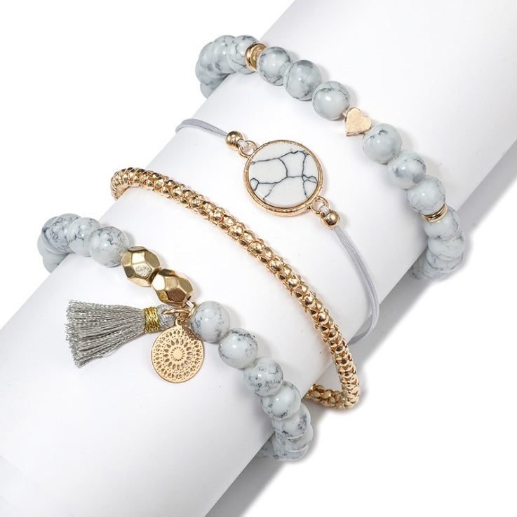 Geometric Hollow Fringed Pine Stone Bracelet – 4-Piece Boho Set for Women