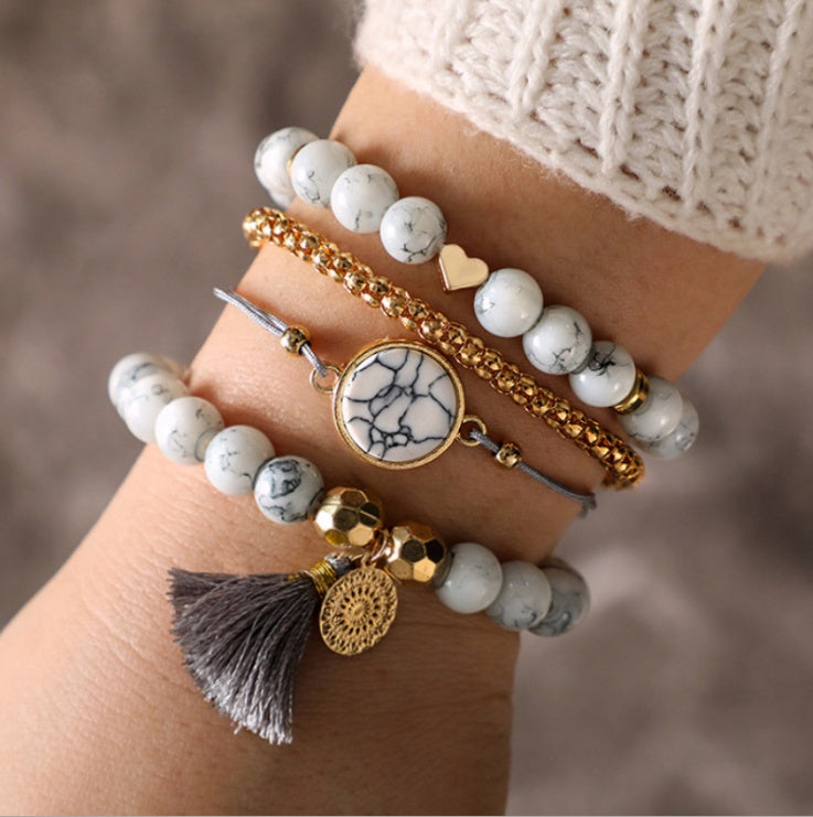 Geometric Hollow Fringed Pine Stone Bracelet – 4-Piece Boho Set for Women