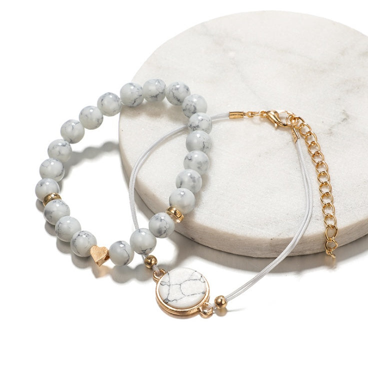 Geometric Hollow Fringed Pine Stone Bracelet – 4-Piece Boho Set for Women